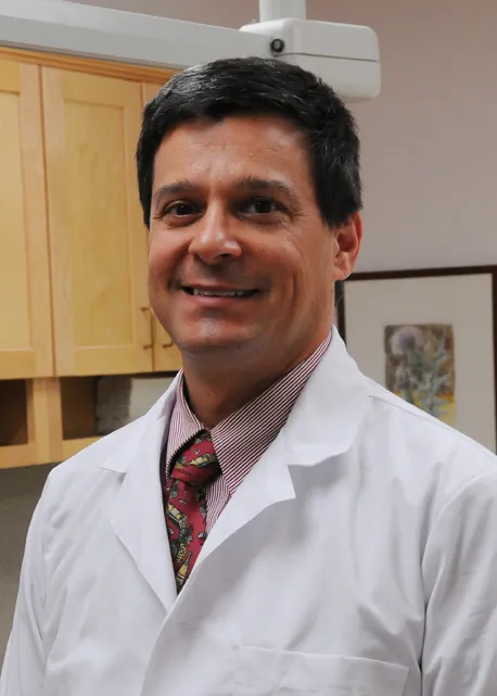 Dr. Douglas Callis in a white coat